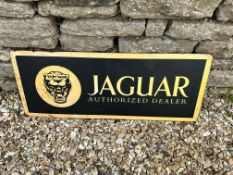 A Jaguar Authorized Dealer singled sided tin advertising sign, 36 x 14".