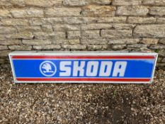A Skoda dealership long rectangular single sided light-up advertising sign with hanging chains, 62 x