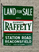 A double sided 'Land For Sale' enamel sign with hanging flange, for agents Hamnett Raffety & Co.