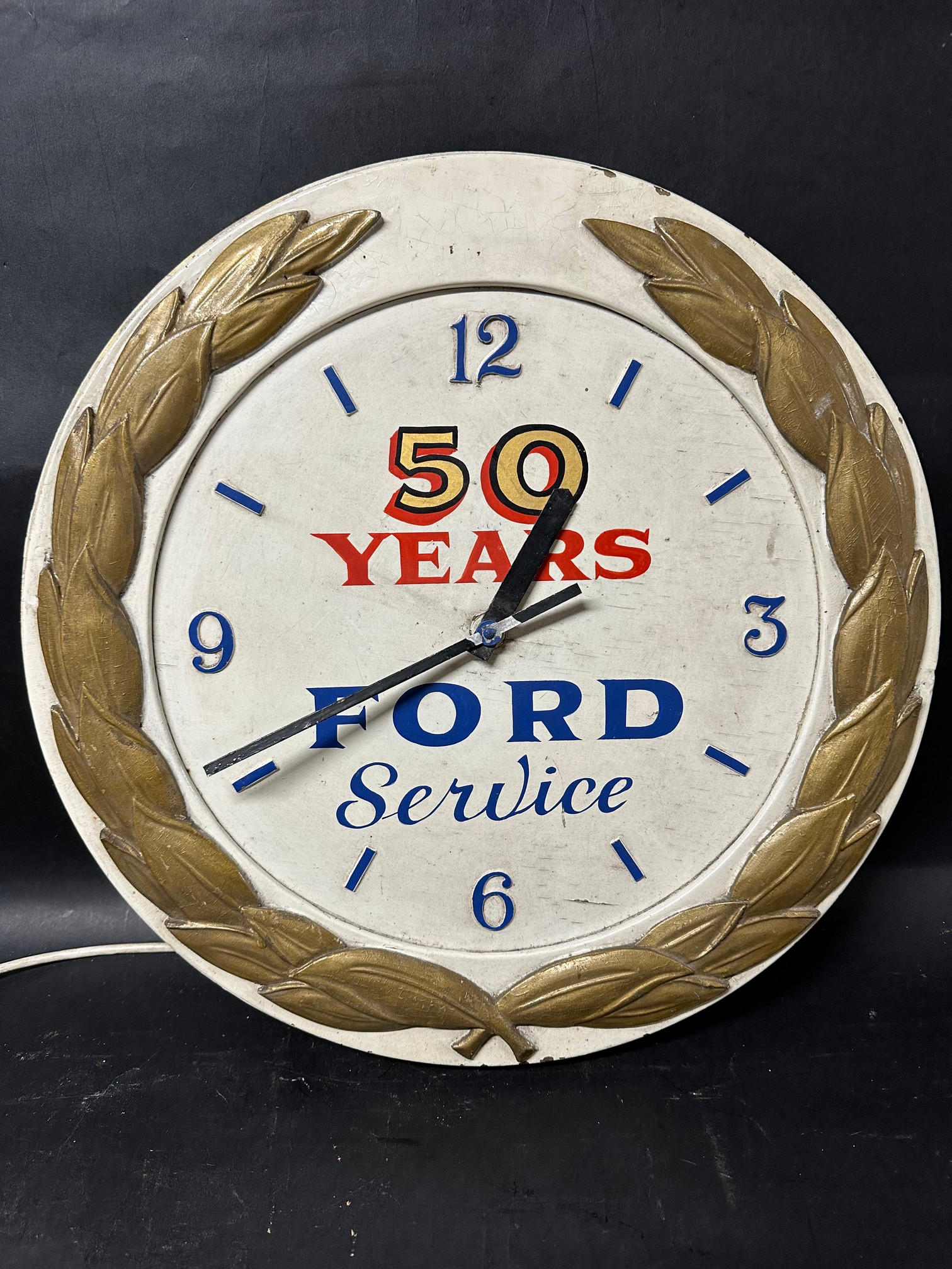 A Ford 50 years of service wooden wall clock presented to dealers for long service, 20 1/2"