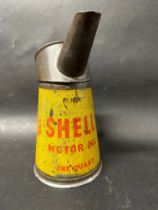 A Shell Motor Oil one quart oil measure, dated '48.