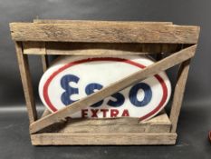 An ESSO Extra glass petrol pump globe in original wooden shipping crate, faintly stamped as made