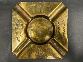 A Silvertown Oils brass ashtray.