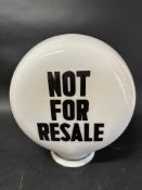 A 'Not For Resale' glass pill-shaped petrol pump globe stamped: Property of Shell-Mex & BP, some
