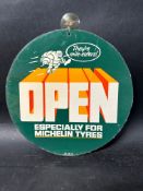 A Michelin Tyres circular open/closed retail window/door sign depicting Mr Bibendum straddling the