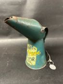 A Whites Velvene Motor Oil pint size pourer dated 1934 with attached Shell Morris Mini-Minor disk.