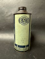 A Baco Motor Products shock absorber fluid cylindrical quart can.