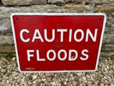 A Caution Floods cast alloy road sign, 21 x 15".