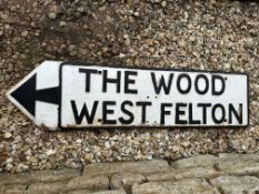 A heavy cast directional road sign for The Wood West Felton, 45 x 11 1/2".