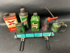 A selection of oil cans including Castrol, Redex, Raleigh and a Lucas display rack.