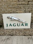 A Jaguar showroom wall sign with leaping cat mascot, 62 x 36 3/4".