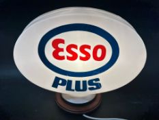 An ESSO Plus plastic petrol globe
