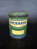An Alexander Duckhams 1lb size grease tin.