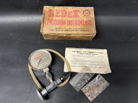 A Redex Service petrol compression test gauge in packing box.