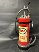An Esso Two Stroke Service forecourt oil dispensing trolley.