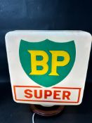 A BP Super petrol pump globe, stamped Hailware, rubber seal tight on neck so unable to easily view