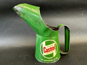 A Wakefield Castrol Motor Oil pint measure.