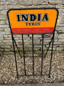 An India Tyres 'The Finest Tyres Made' doubled sided enamel advertising sign mounted in a tyre