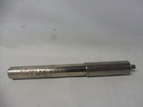A Grappler Tyres hand-operator bicycle pump.