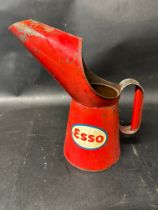 An Esso one quart pourer marked BCM/DTM to handle.