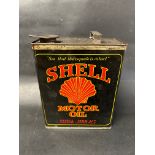 A black Shell Motor Oil gallon can in excellent condition, stamped 'double' to one side.