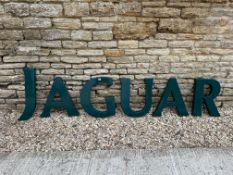 A Jaguar showroom display comprising six plastic letters forming the name Jaguar, J measures 4 1/2 x