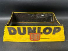 A Dunlop 90 tyre display stand, heavily restored.