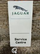 A large Jaguar Service Centre dealership wall sign with illuminated lettering. 35 1/2 x 70 3/4".