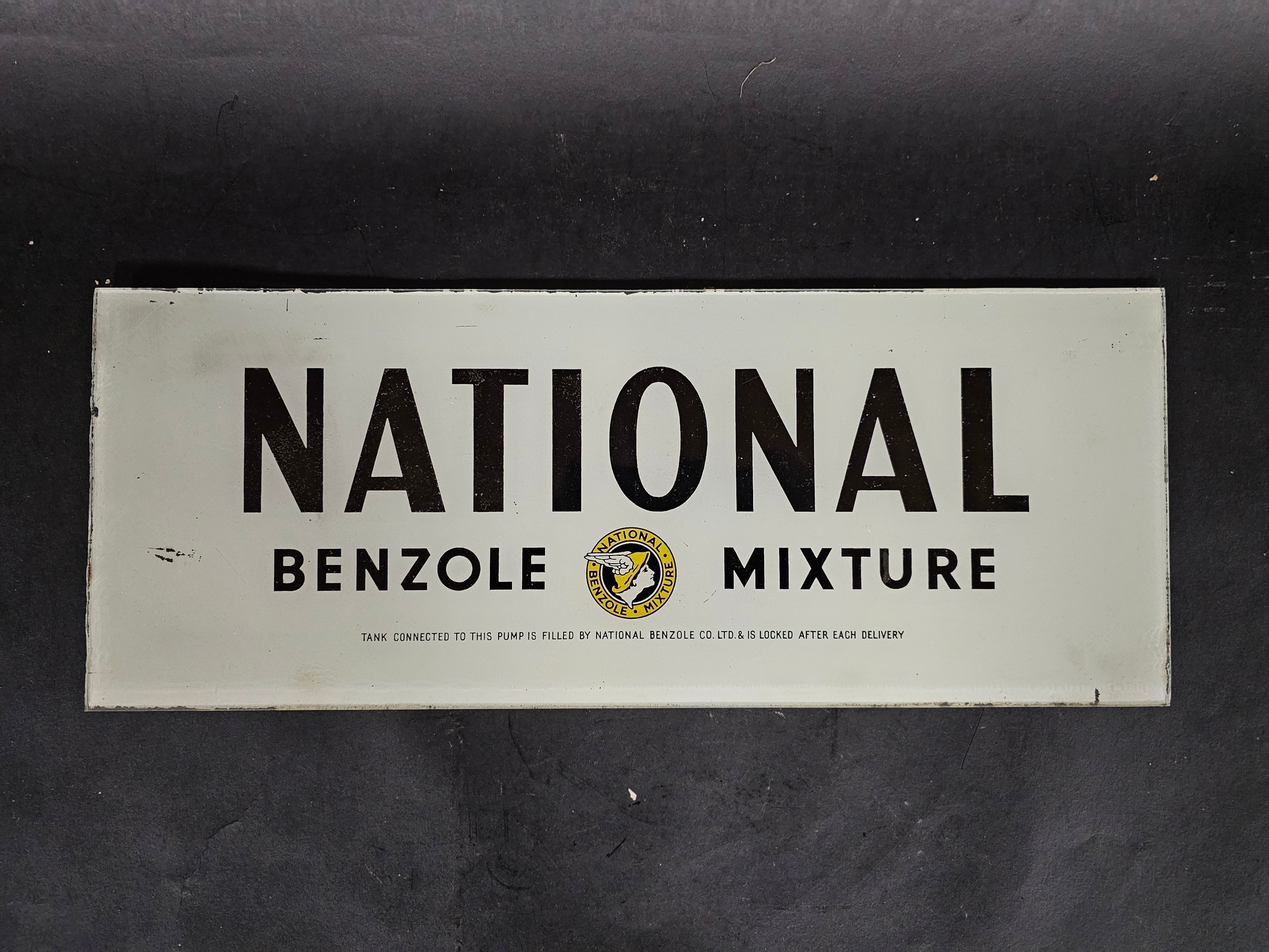 A National Benzole Mixture glass advertising insert from a petrol pump, 16 3/4 x 6 1.2".