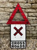 A cast alloy sign for Cross Roads with triangle warning top and all reflectors present, 17 1/2 x
