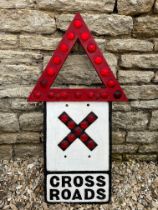 A cast alloy sign for Cross Roads with triangle warning top and all reflectors present, 17 1/2 x