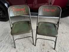 A pair of metal 'krafters' folding chairs with painted Castrol lettering.