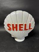 A 'Shell' glass petrol pump globe stamped Webbs Crystal Glass co, heavily damaged.