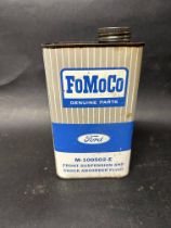 A FoMoCo Ford Genuine Parts one quart oil can for suspension and shock absorber fluid, with cap.
