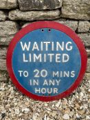 A Waiting Limited circular pressed alloy road sign, 20" diameter.