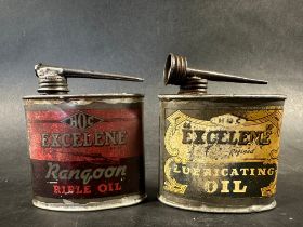 Two Humber Oil Company Excelene oval oil tins, one Rangoon Rifle Oil, the other a lubricating oil.