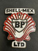 A Shell-Mex & BP Ltd part enamel cap badge.
