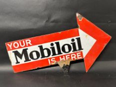A Your Mobiloil Is Here double sided directional enamel sign in the form of an arrow, 33 x 19 1/2".