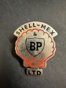 A Shell-Mex & BP Ltd part enamel cap badge.
