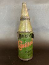 An early Wakefield Castrol Motor Oil conicle tin with mounting bracket. Maynell's Patent "