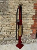 An early Vickers Armstrong Ltd model C hand crank petrol pump complete with original hose and