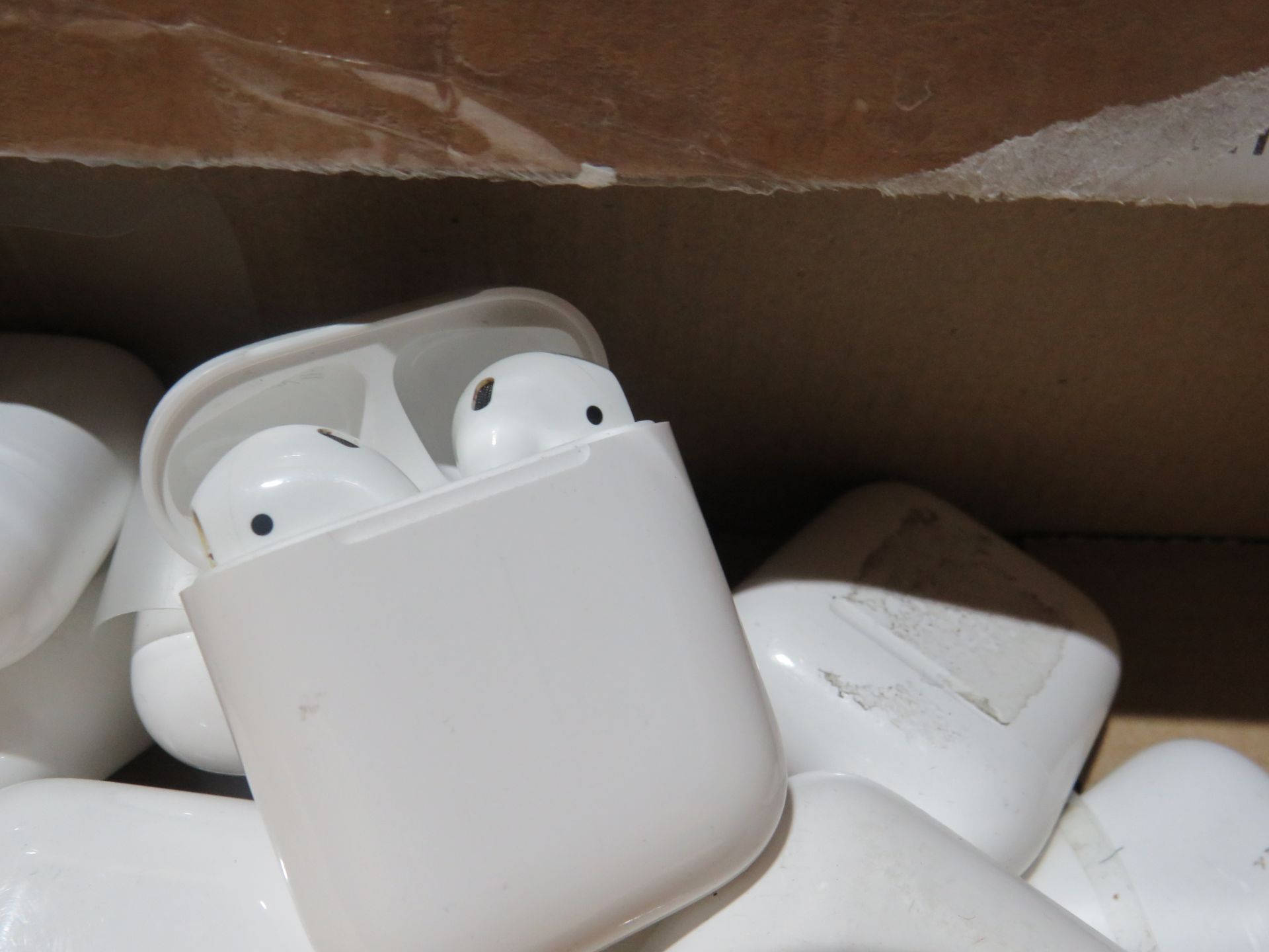 Apple air pods, these are completely unchecked returns they all have 2 air pods and a charging