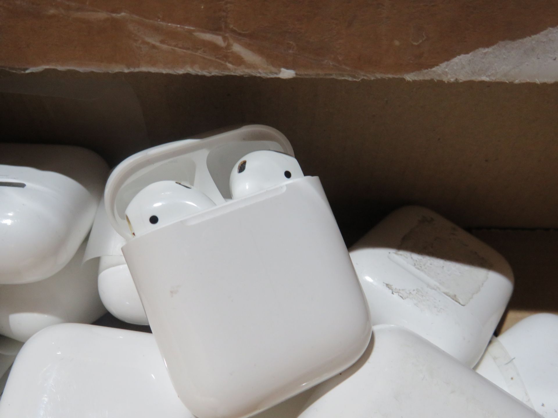 Apple air pods, these are completely unchecked returns they all have 2 air pods and a charging