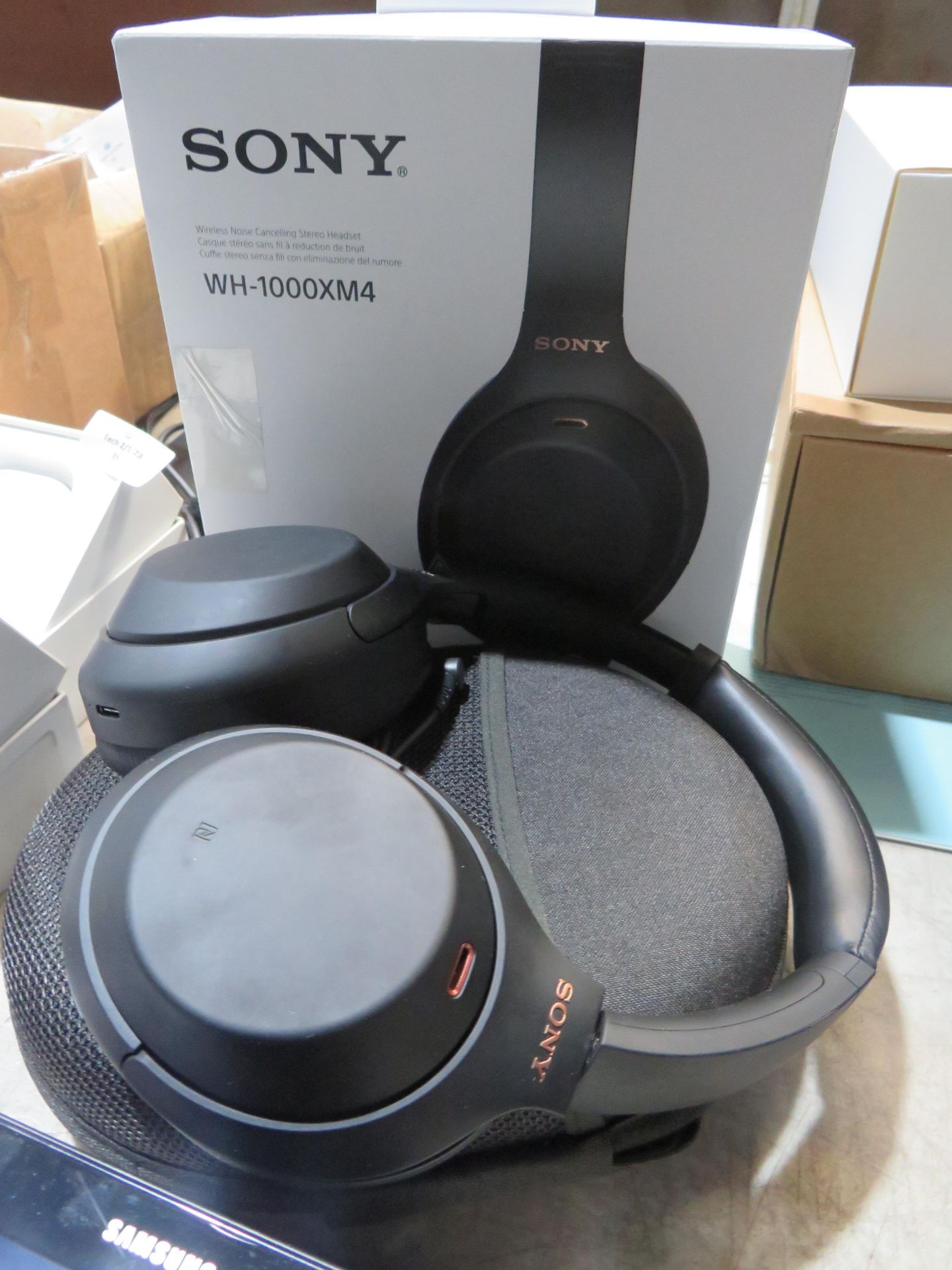 Sony W1000-XM4 Bluetooth Headphones in original packaging (unchecked) zip in case needs repair