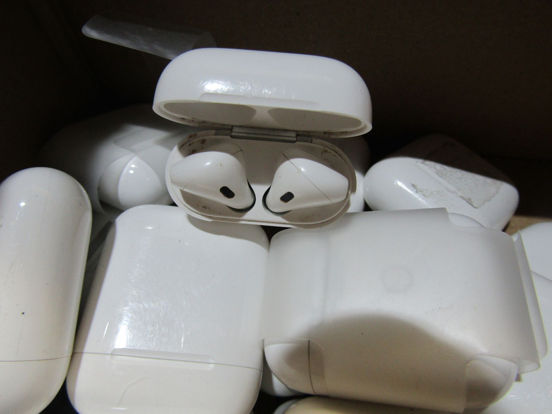 Apple air pods, these are completely unchecked returns they all have 2 air pods and a charging