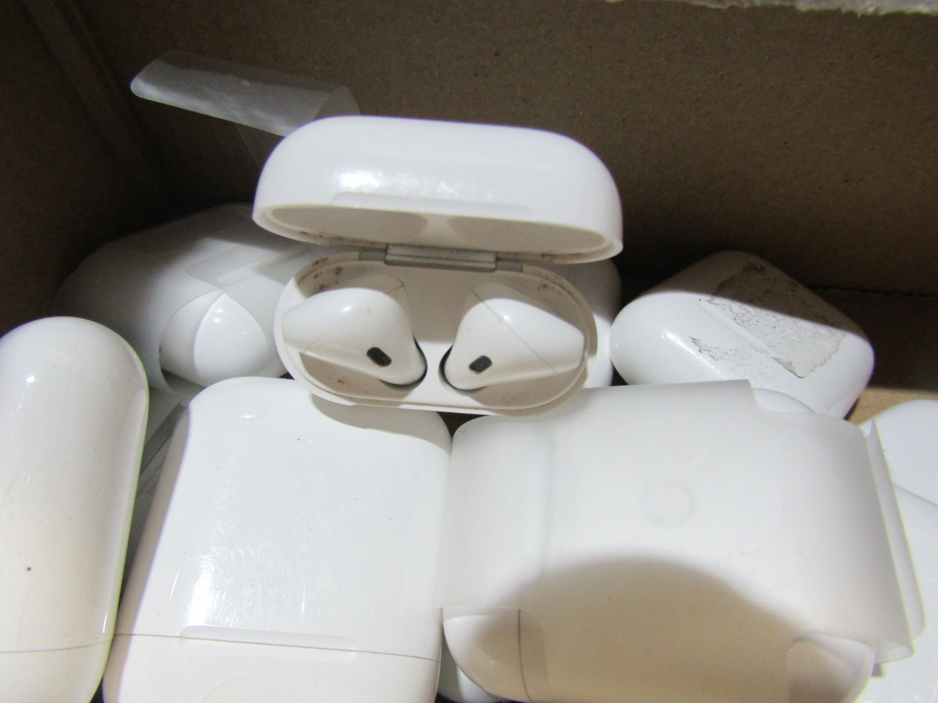 Apple air pods, these are completely unchecked returns they all have 2 air pods and a charging