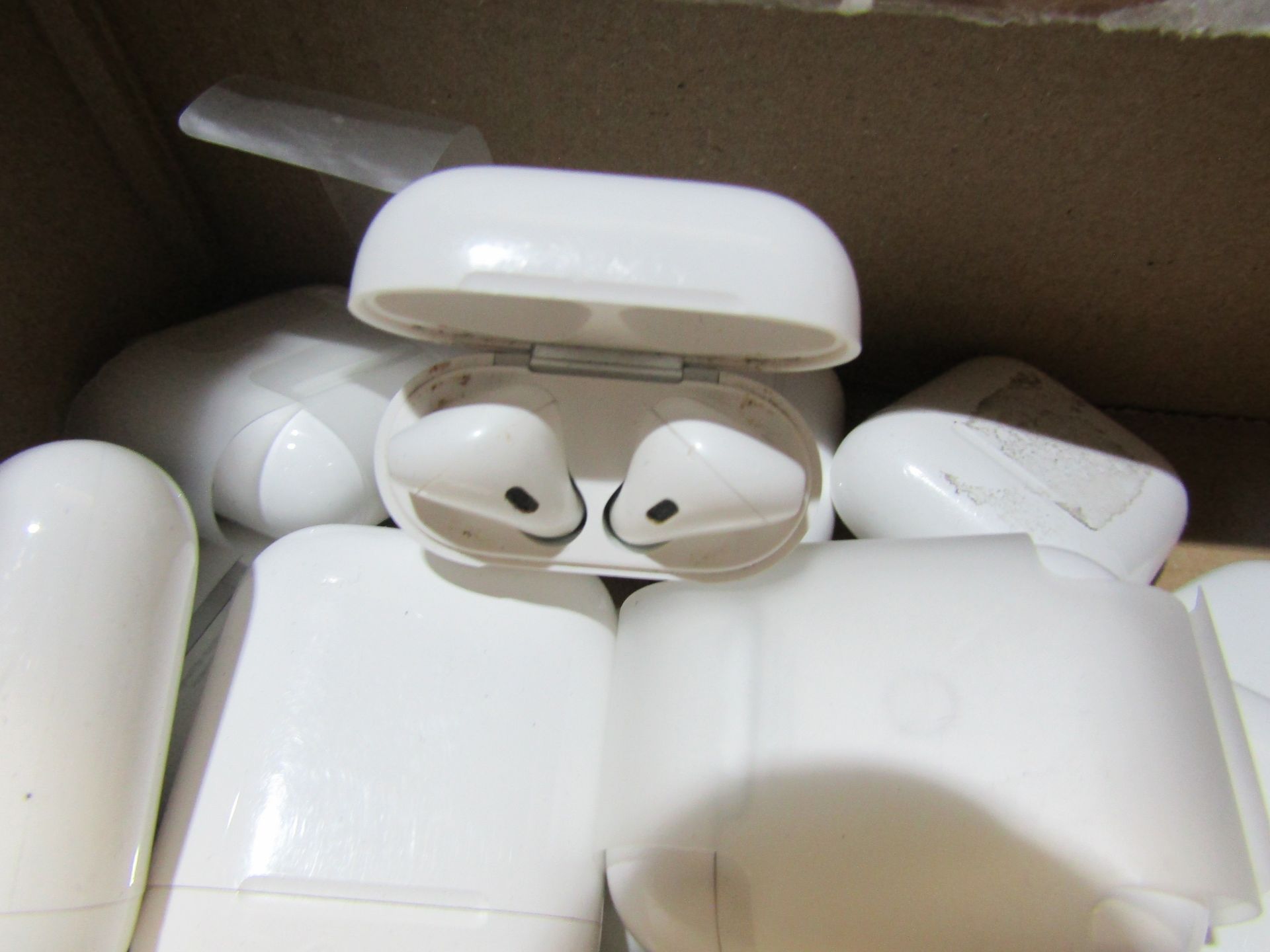 Apple air pods, these are completely unchecked returns they all have 2 air pods and a charging