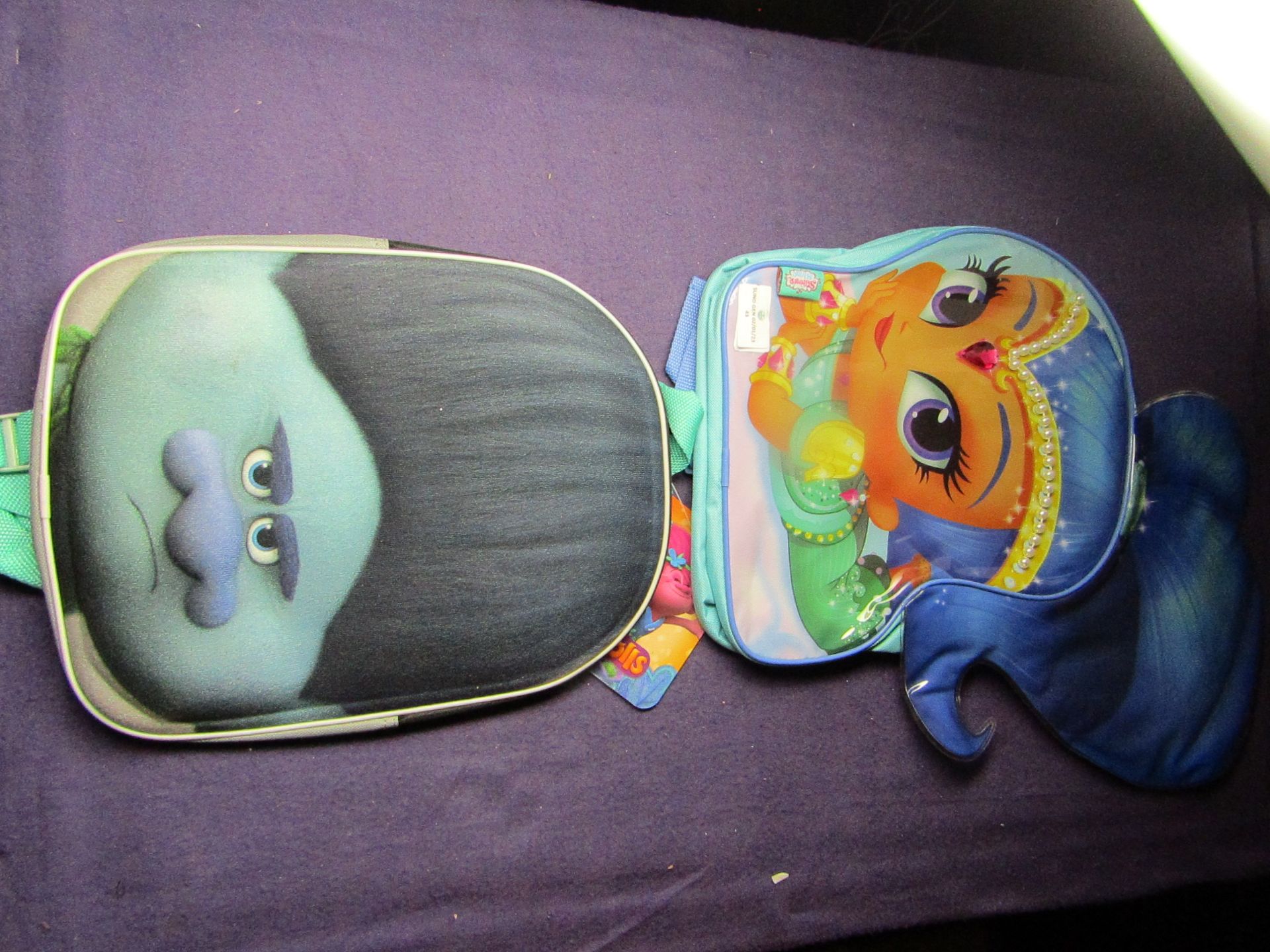 1x Shimmer & Sparkle - 3D Backpack - Unused & Packaged. 1x Trolls - 3D Backpack - Unused, No