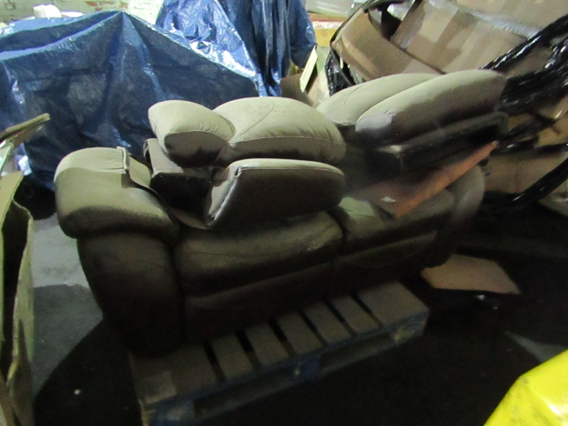 Pallet containg a Costco return 2 seater leather sofa/. This has been stored for a couple of years