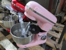 Pink Von Shef stand mixer with 3 attachments, it appears to be working as in the attachment turns